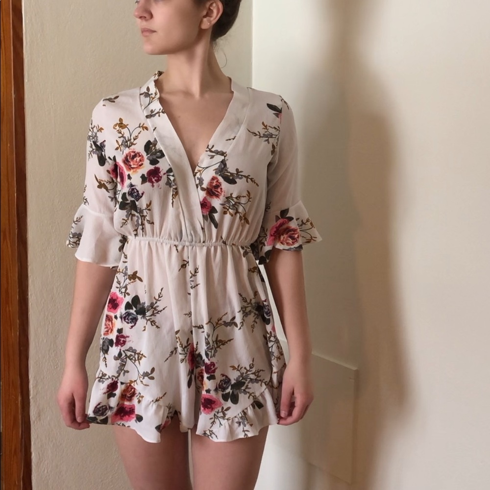 White floral v cut romper
